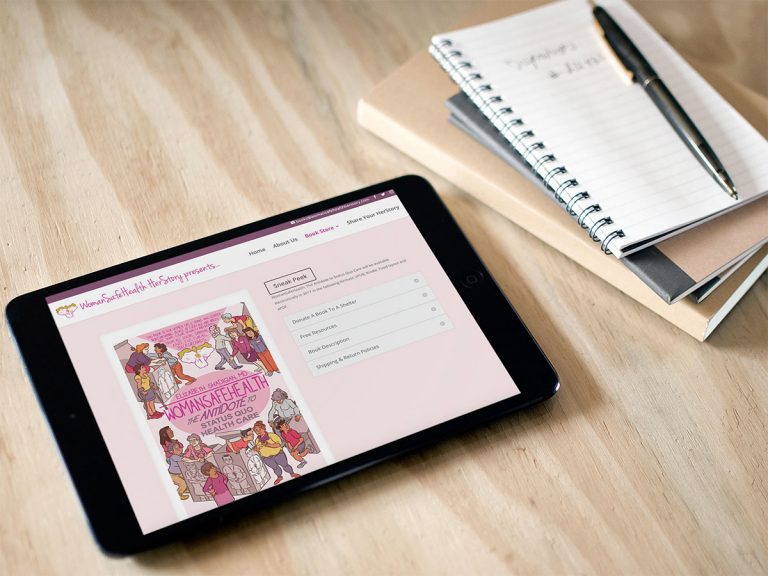 Book page on WomanSafeHealth Herstory website shown on iPad